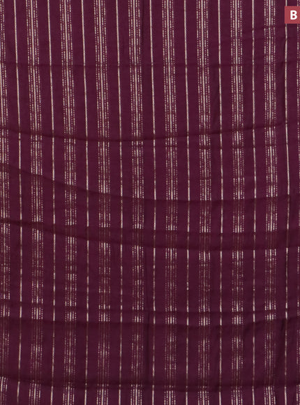 Assam silk saree wine shade with allover zari woven stripes pattern and zari woven border