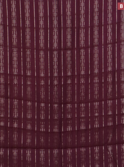 Assam silk saree wine shade with allover zari woven stripes pattern and zari woven border