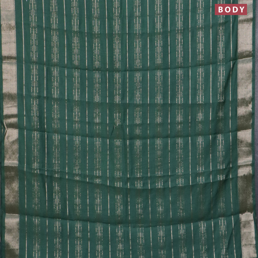 Assam silk saree green with allover zari woven stripes pattern and zari woven border