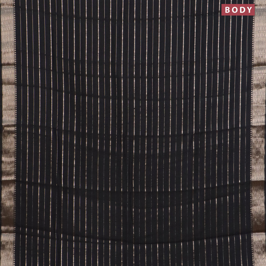 Assam silk saree black with allover zari woven stripes pattern and zari woven border