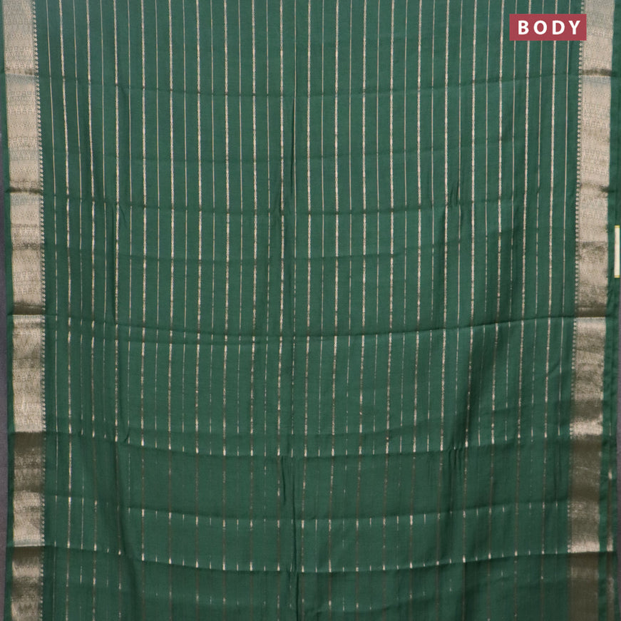 Assam silk saree green with allover zari woven stripes pattern and zari woven border