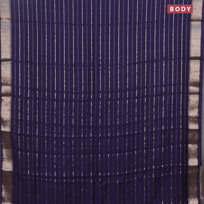 Assam silk saree blue with allover zari woven stripes pattern and zari woven border