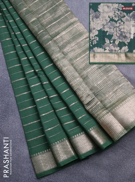 Assam silk saree green with allover zari woven stripes pattern and zari woven border