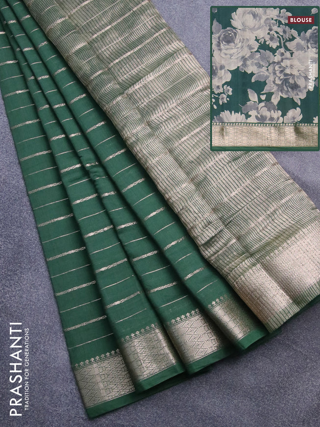 Assam silk saree green with allover zari woven stripes pattern and zari woven border