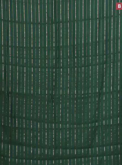 Assam silk saree green with allover zari woven stripes pattern and zari woven border