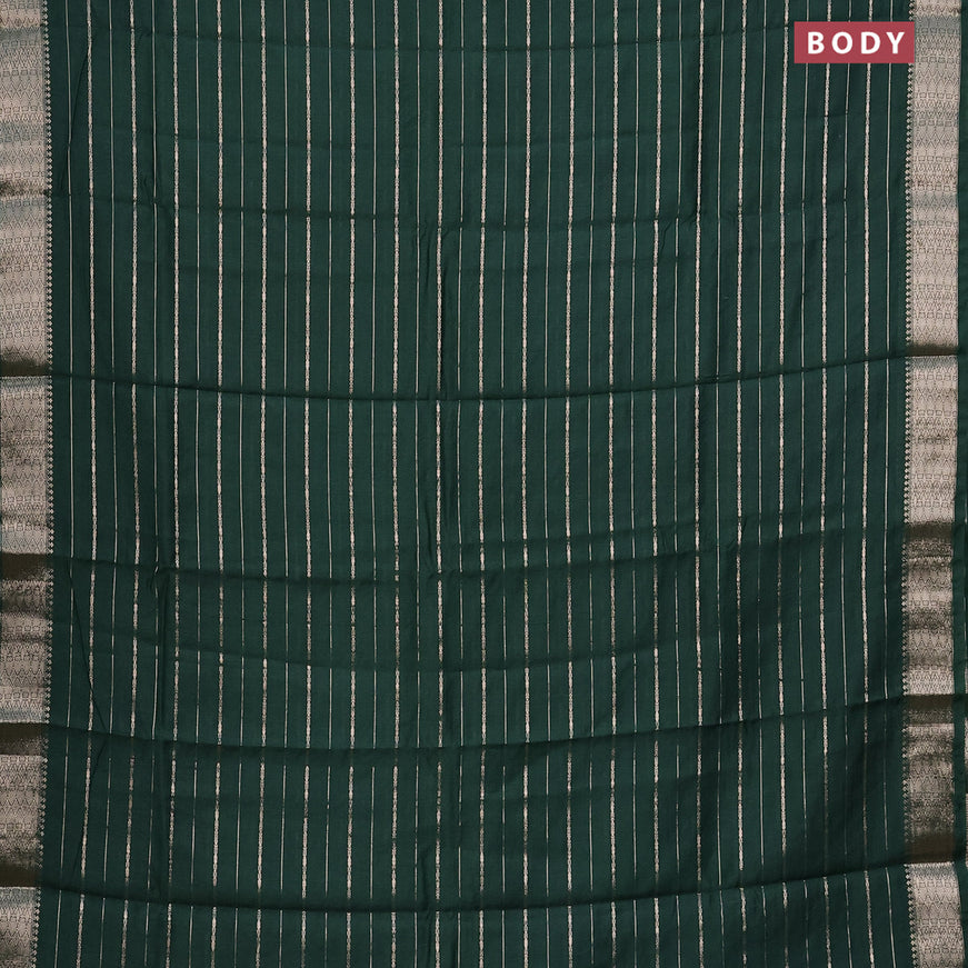 Assam silk saree green with allover zari woven stripes pattern and zari woven border