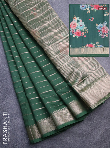 Assam silk saree green with allover zari woven stripes pattern and zari woven border