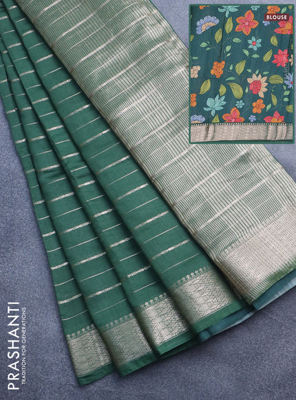 Assam silk saree green with allover zari woven stripes pattern and zari woven border