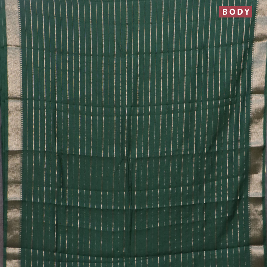 Assam silk saree green with allover zari woven stripes pattern and zari woven border