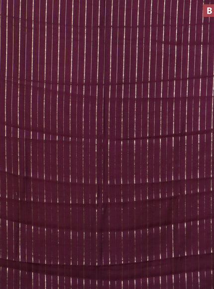 Assam silk saree wine shade with allover zari woven stripes pattern and zari woven border