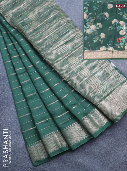 Assam silk saree green with allover zari woven stripes pattern and zari woven border