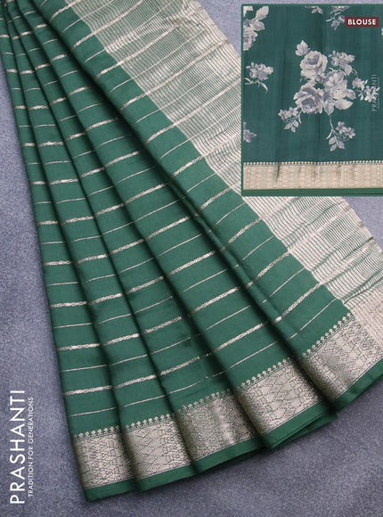 Assam silk saree green with allover zari woven stripes pattern and zari woven border