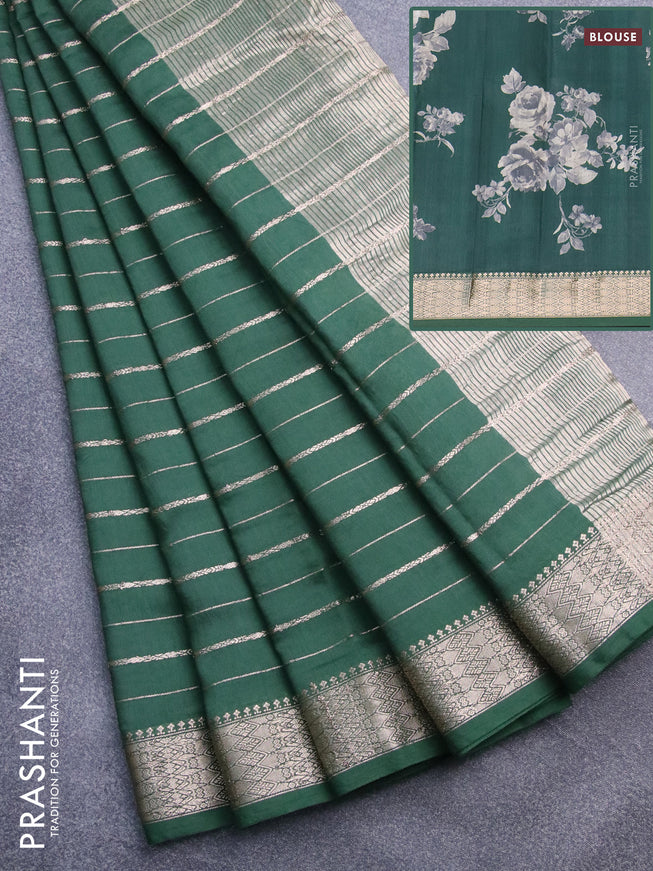 Assam silk saree green with allover zari woven stripes pattern and zari woven border