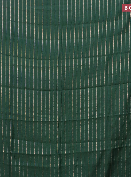 Assam silk saree green with allover zari woven stripes pattern and zari woven border