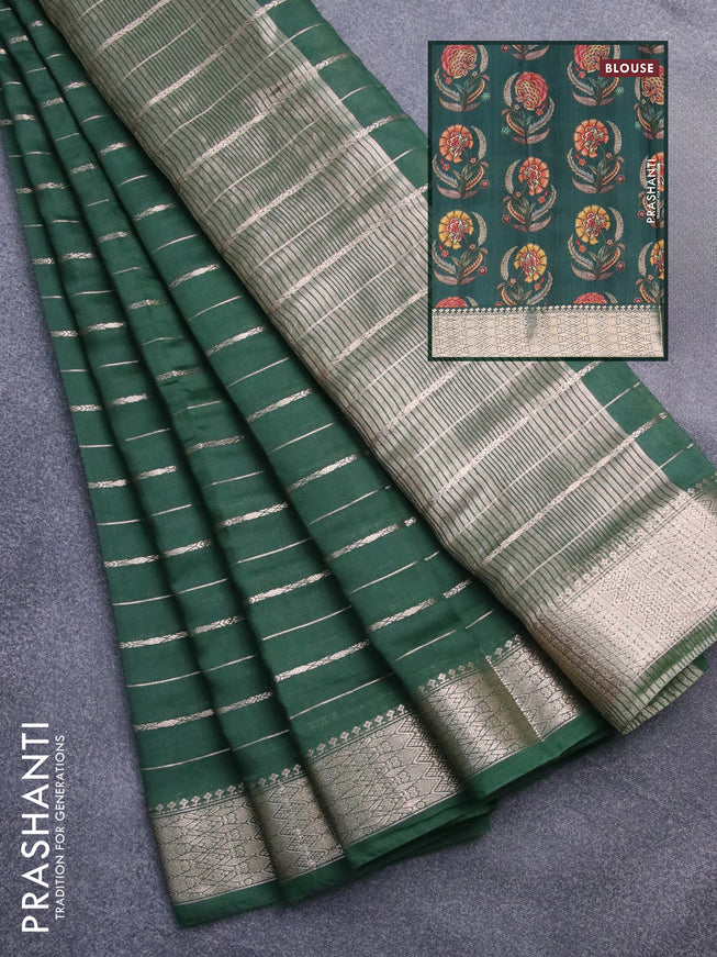 Assam silk saree green with allover zari woven stripes pattern and zari woven border