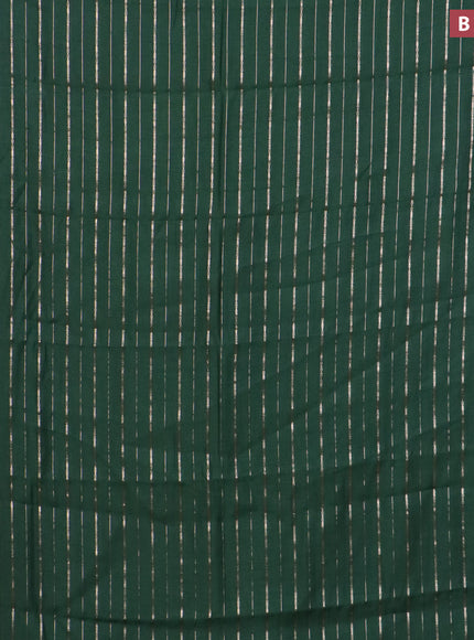 Assam silk saree green with allover zari woven stripes pattern and zari woven border