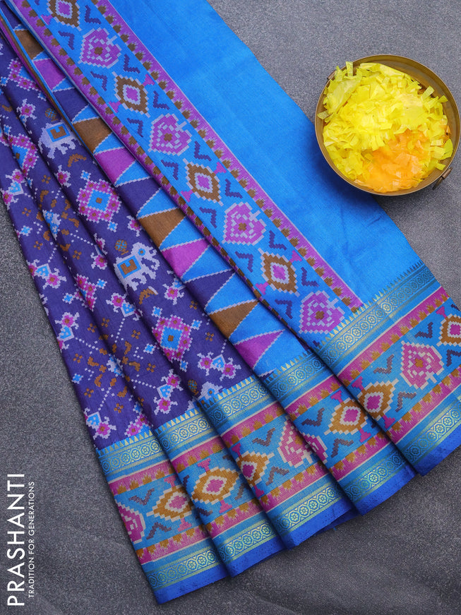 Semi tussar saree blue and cs blue with allover ikat prints and ikat woven zari border