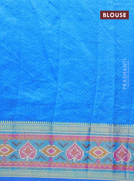 Semi tussar saree blue and cs blue with allover ikat prints and ikat woven zari border