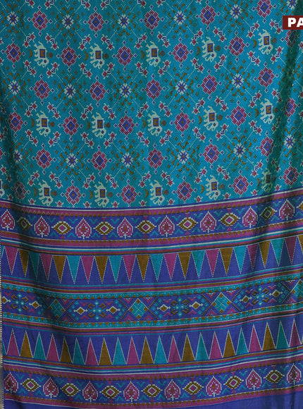 Semi tussar saree dual shade of teal blue and dual shade of blue with allover ikat prints and ikat woven zari border