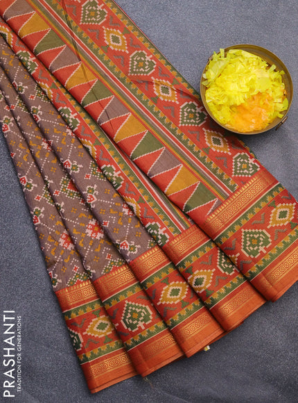 Semi tussar saree dual shade of brown and dual shade of rust with allover ikat prints and ikat woven zari border