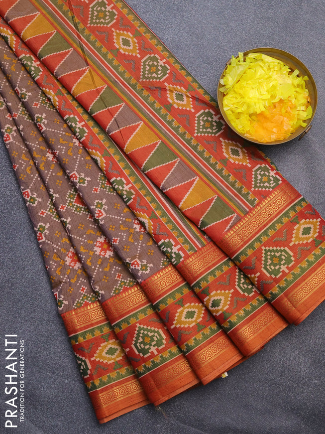 Semi tussar saree dual shade of brown and dual shade of rust with allover ikat prints and ikat woven zari border