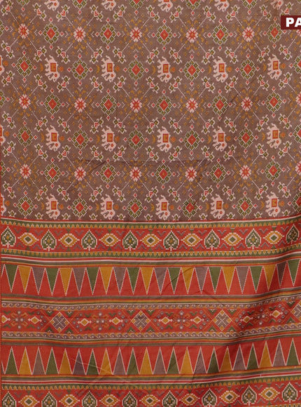 Semi tussar saree dual shade of brown and dual shade of rust with allover ikat prints and ikat woven zari border