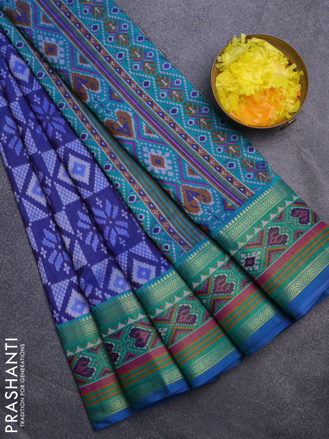 Semi tussar saree blue and teal green with allover ikat prints and ikat woven zari border