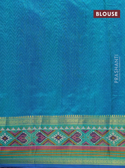 Semi tussar saree blue and teal green with allover ikat prints and ikat woven zari border