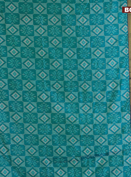 Semi tussar saree teal blue and dual shade of bluish green with allover ikat prints and ikat woven zari border