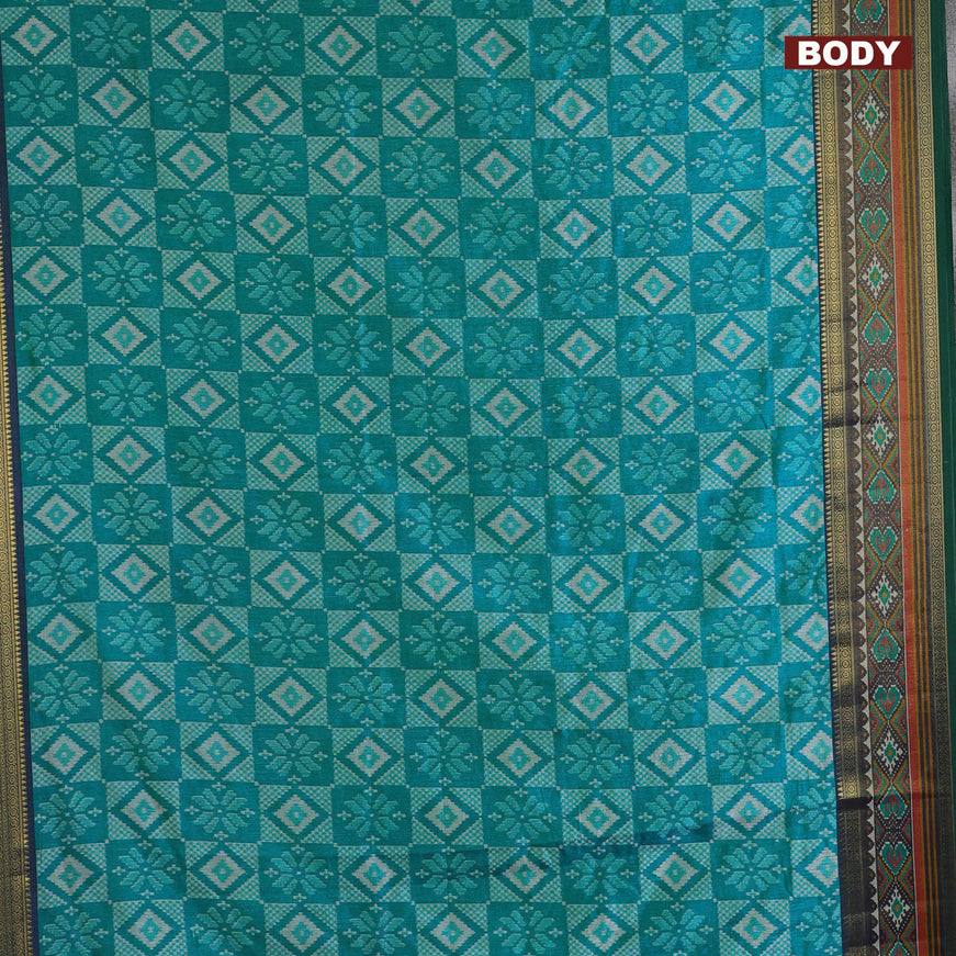 Semi tussar saree teal blue and dual shade of bluish green with allover ikat prints and ikat woven zari border