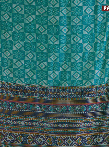 Semi tussar saree teal blue and dual shade of bluish green with allover ikat prints and ikat woven zari border