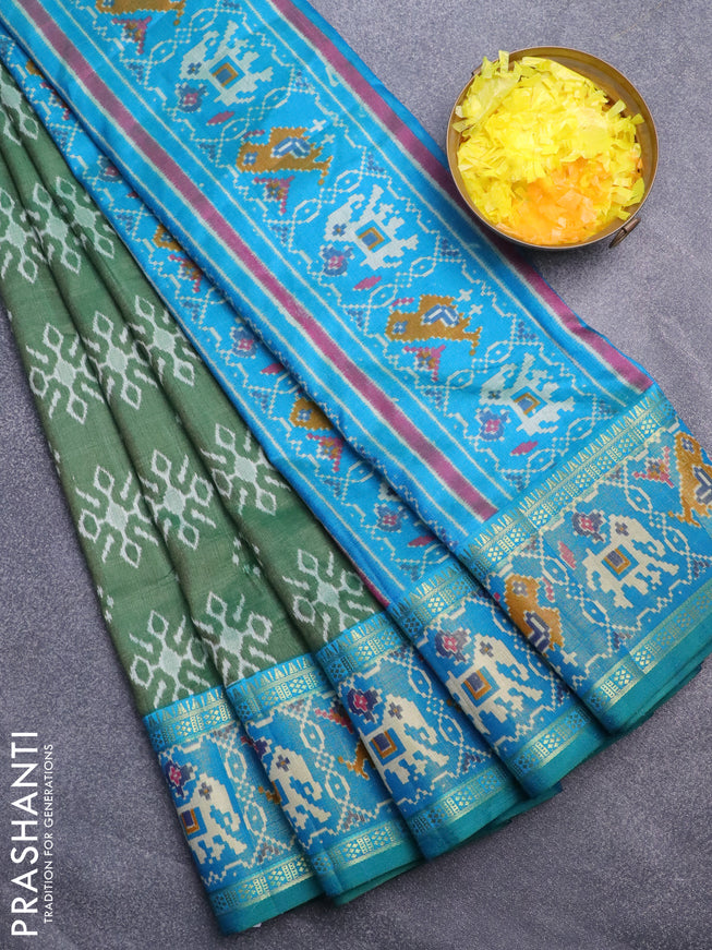 Semi tussar saree green and teal blue with allover ikat butta weaves and ikat woven zari border