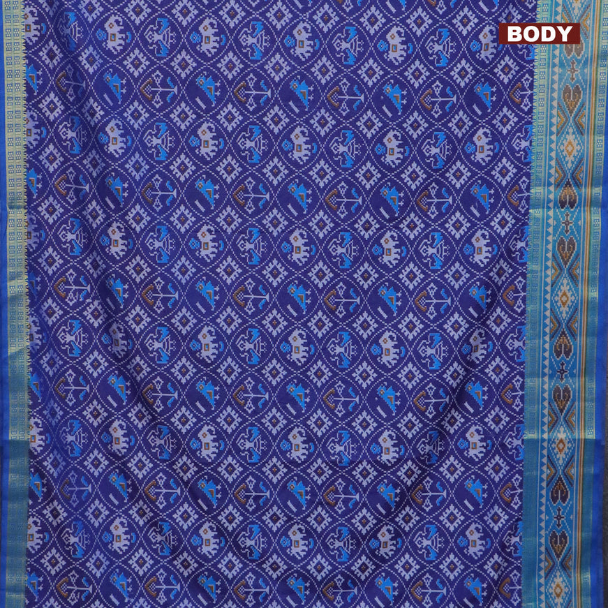 Semi tussar saree blue and cs blue with allover patola prints and ikat woven zari border