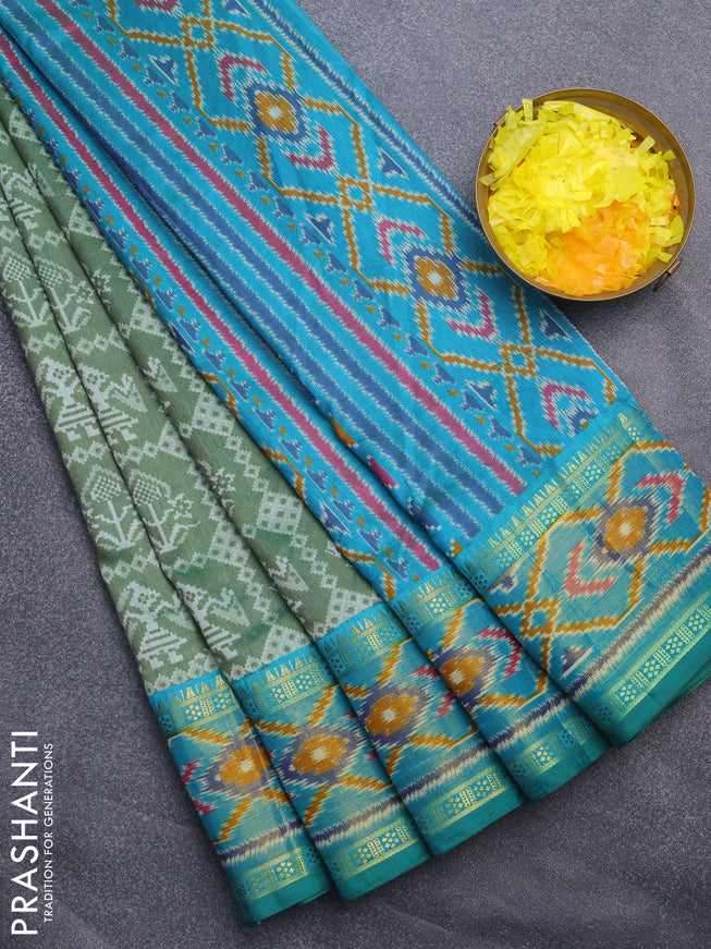 Semi tussar saree green shade with allover patola prints and ikat woven zari border