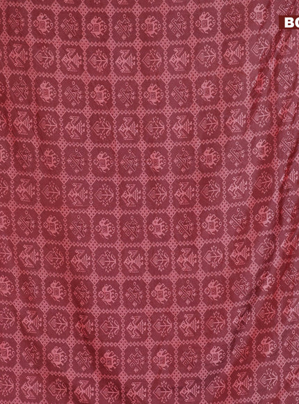 Semi tussar saree maroon shade and pink with allover patola prints and ikat woven zari border