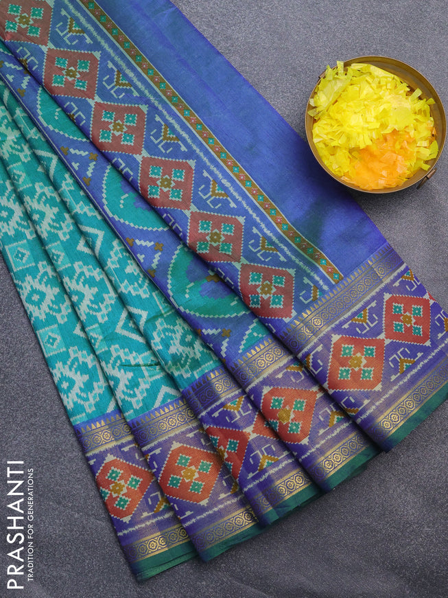 Semi tussar saree dual shade of teal blue and dual shade of blue with allover ikat prints and zari woven border