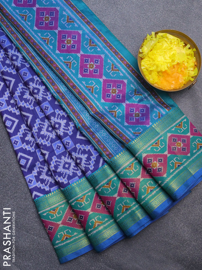 Semi tussar saree blue and dual shade of teal green with allover ikat prints and zari woven border