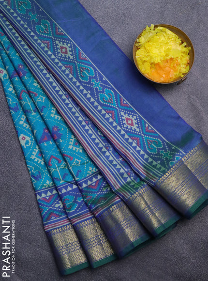 Semi tussar saree cs blue and dual shade of bluish green with allover patola prints and zari woven border