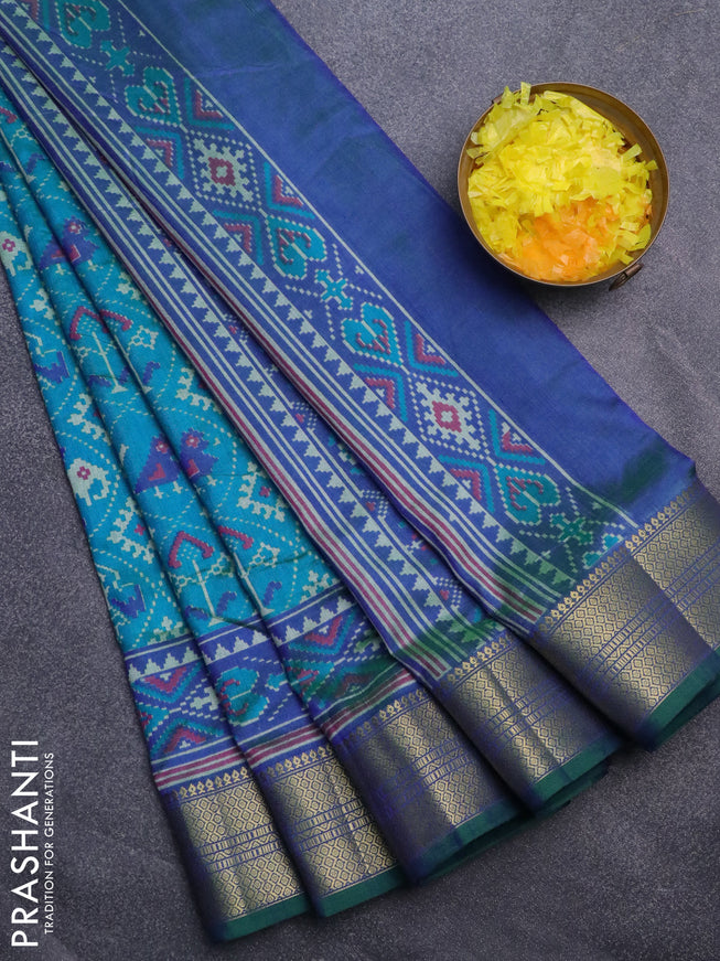 Semi tussar saree cs blue and dual shade of bluish green with allover patola prints and zari woven border