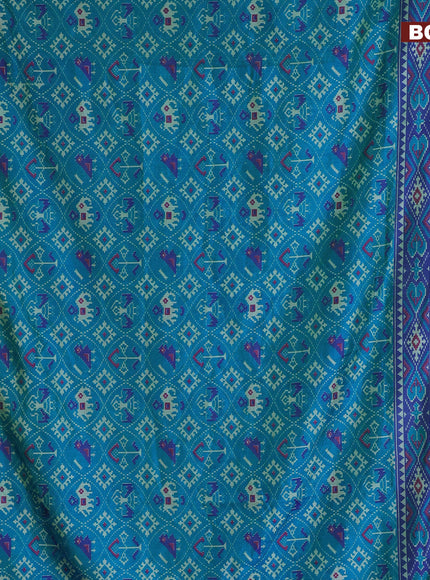 Semi tussar saree cs blue and dual shade of bluish green with allover patola prints and zari woven border