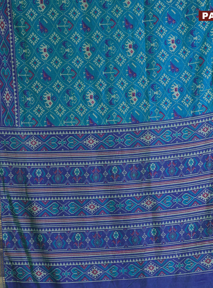 Semi tussar saree cs blue and dual shade of bluish green with allover patola prints and zari woven border