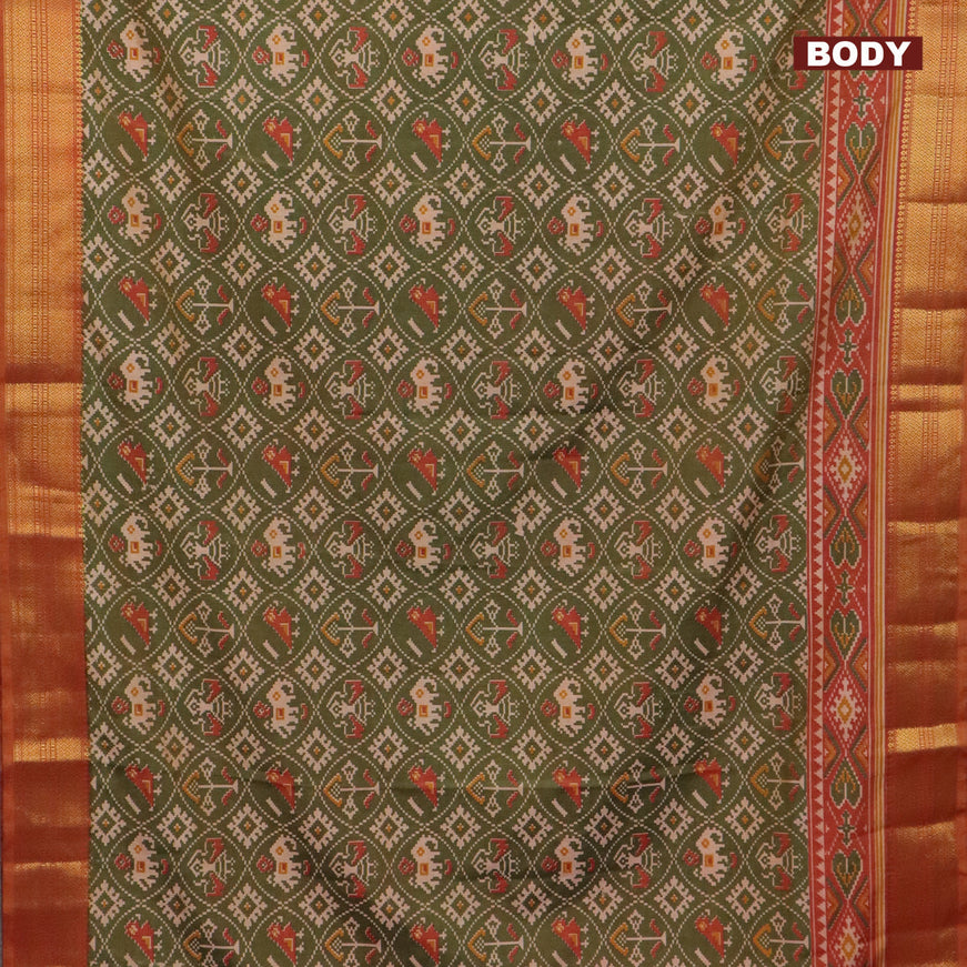 Semi tussar saree green shade and rust shade with allover patola prints and zari woven border