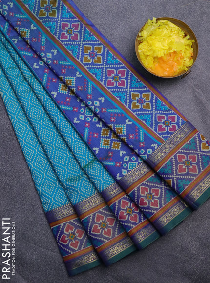 Semi tussar saree dual shade of cs blue and dual shade of blue with allover ikat prints and ikat woven zari border