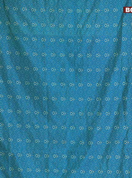 Semi tussar saree dual shade of cs blue and dual shade of blue with allover ikat prints and ikat woven zari border