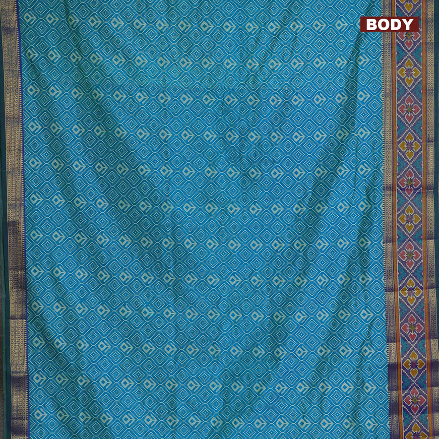 Semi tussar saree dual shade of cs blue and dual shade of blue with allover ikat prints and ikat woven zari border