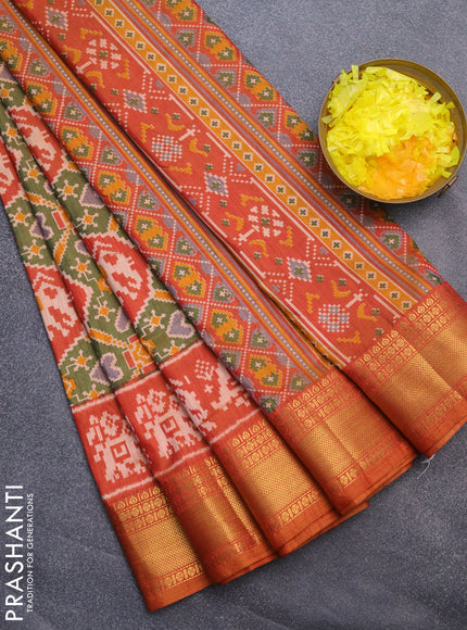 Semi tussar saree sap green and rust shade with allover patola prints and zari woven border