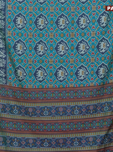 Semi tussar saree teal blue and green with allover patola prints and zari woven border