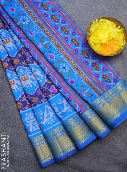 Semi tussar saree dark blue and cs blue with allover patola prints and ikat woven zari border