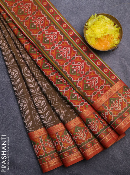 Semi tussar saree dual shade of brown and dual shade of rust with allover ikat prints and ikat woven zari border