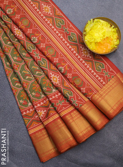 Semi tussar saree sap green and rust shade with allover ikat prints and zari woven border